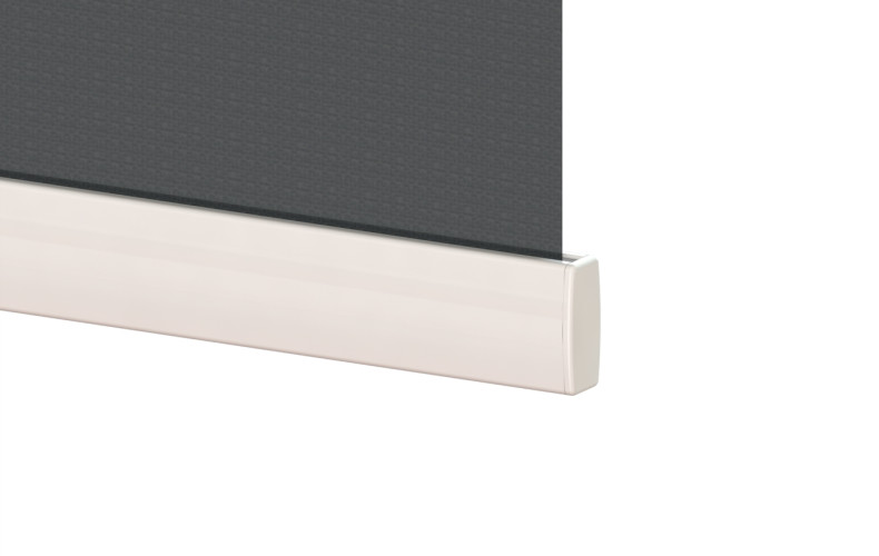 Bottom rail of a dark gray window roller blind with a white end cap (close-up).
